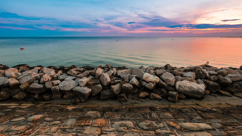 Scenic view of sea against sky during sunset