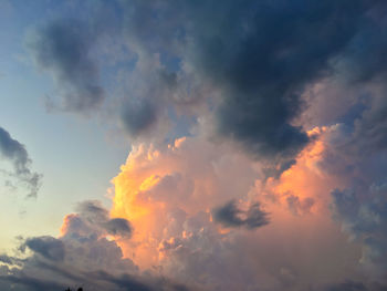 Low angle view of dramatic sky during sunset