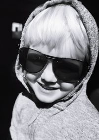 Portrait of smiling man wearing sunglasses