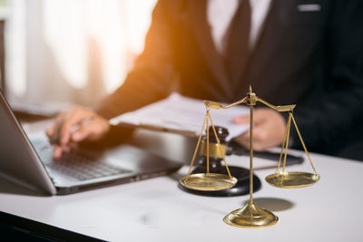 Man using laptop on table