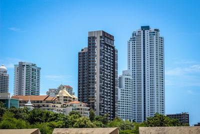 Modern buildings against blue sky
