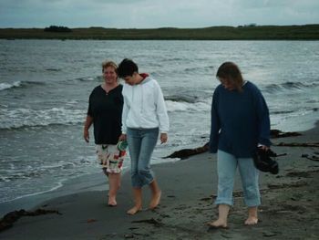 Woman standing on beach