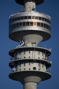 Low angle view of water tower against clear sky