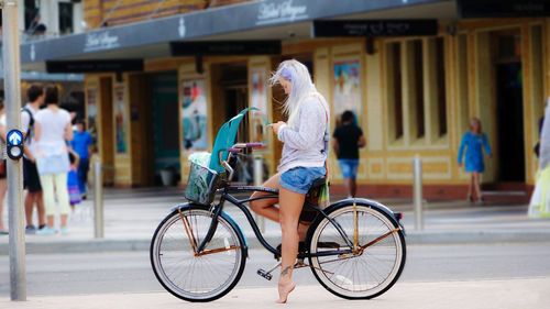 People cycling on bicycle