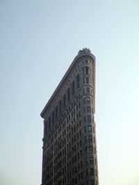 Low angle view of modern buildings against clear sky