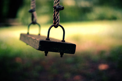 Close-up of swing at playground