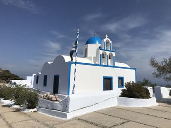 Low angle view of white building against sky