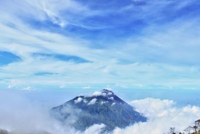 Scenic view of volcanic mountain against sky