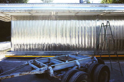 Abandoned car parked in front of street