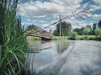 Scenic view of river against sky