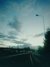 Road against cloudy sky