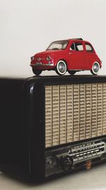 Close-up of toy car against white background