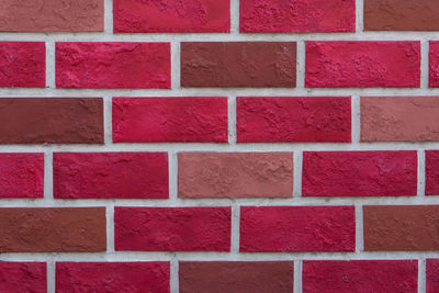 Full frame shot of red brick wall