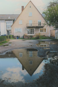 Reflection of houses in water