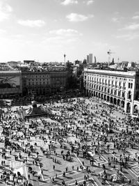 Milan, crowd in duomo square in black and white