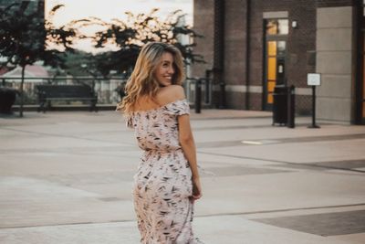 Young woman standing on street