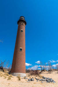 Low angle view of lighthouse against clear sky