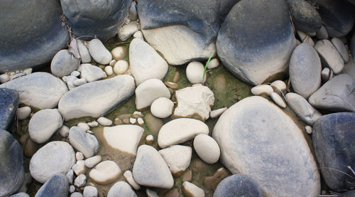 Full frame shot of pebbles at beach