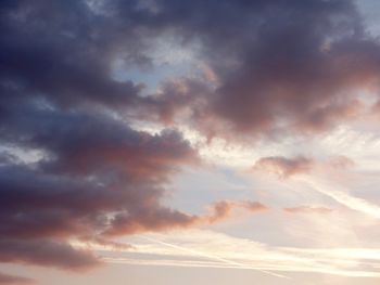 Low angle view of cloudy sky during sunset