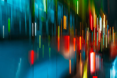 Long exposure image of traffic lights in the city at night. bus with light trail