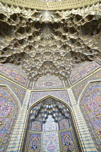 Low angle view of ornate ceiling