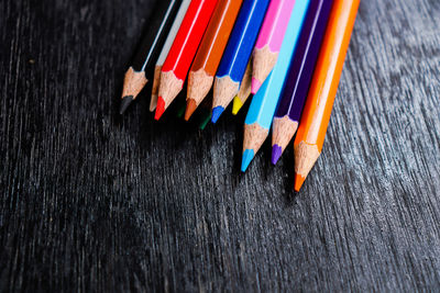 High angle view of multi colored pencils on table