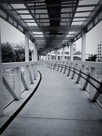 Black and white view of an empty  bridge