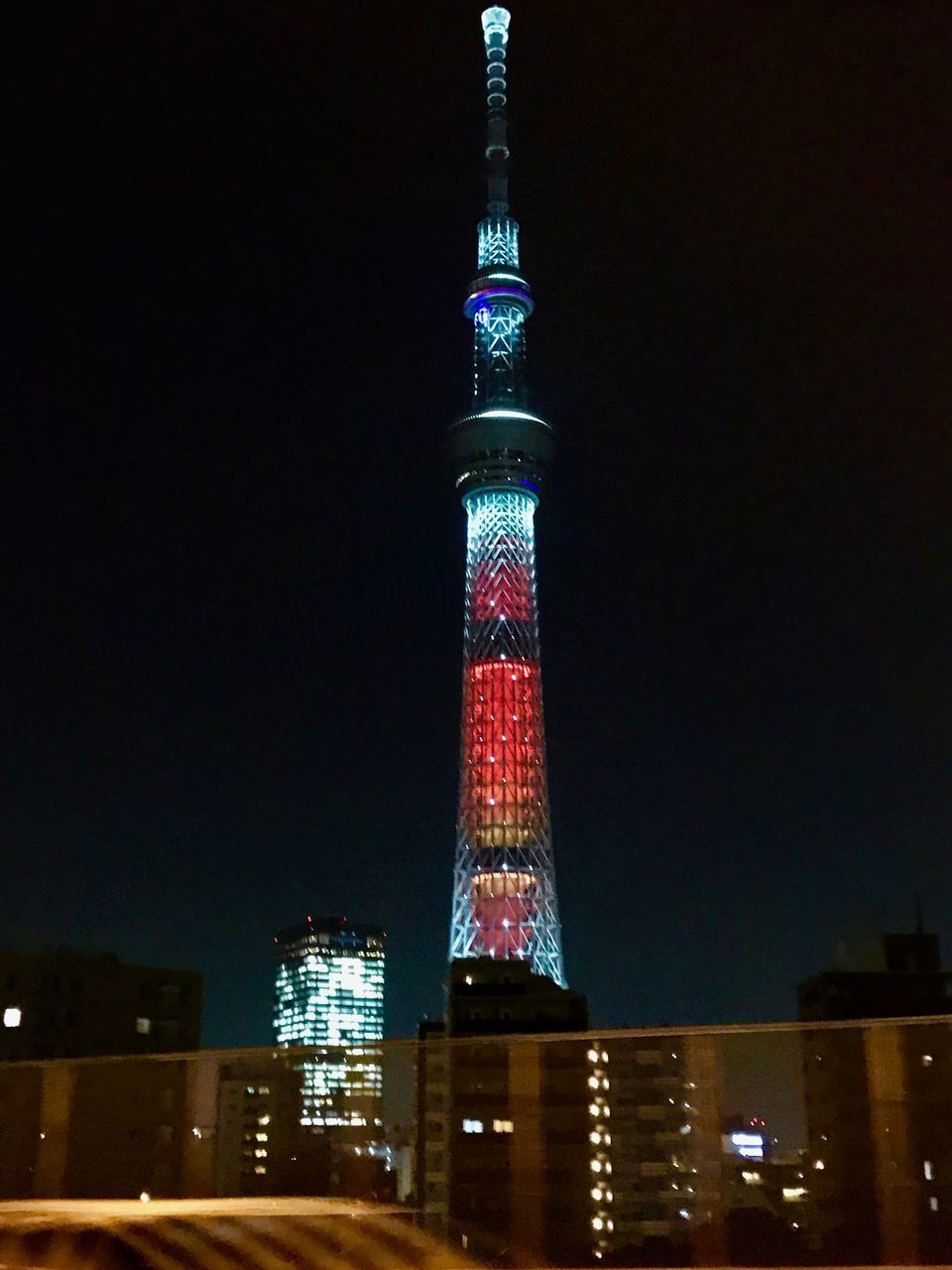 tower, travel, travel destinations, city, tall - high, tourism, night, architecture, illuminated, built structure, low angle view, sky, building exterior, no people, skyscraper, outdoors