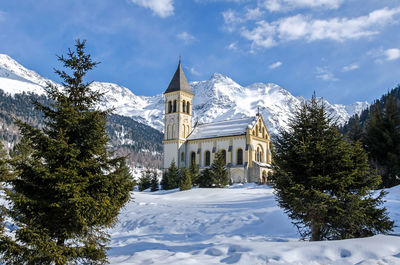 Building against sky during winter