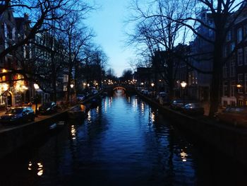 River passing through city at night