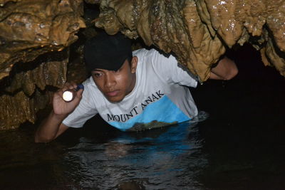 Low section of man in cave