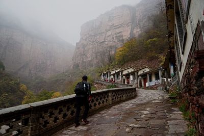 Woman standing on mountain