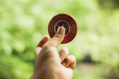 Cropped hand holding toy