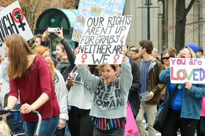 Woman with text on the road