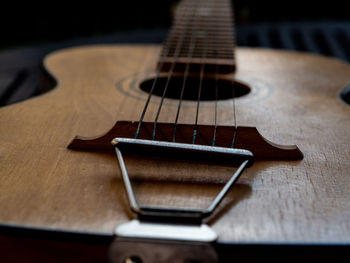 High angle view of guitar on table