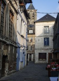 Narrow street amidst buildings in town