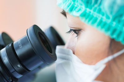 Close-up of woman working in laboratory