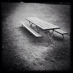 Empty benches in the dark