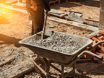 Low section of man working at construction site