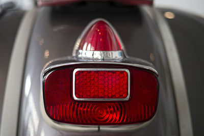 Close-up of red vintage car