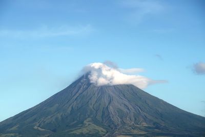 Scenic view of volcanic mountain against sky