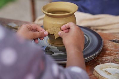 Midsection of woman preparing food