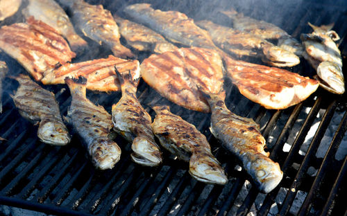 Grilled fish on charcoal