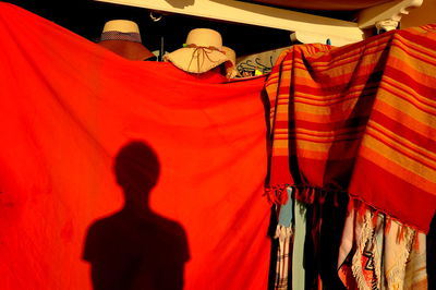 Rear view of people at market stall
