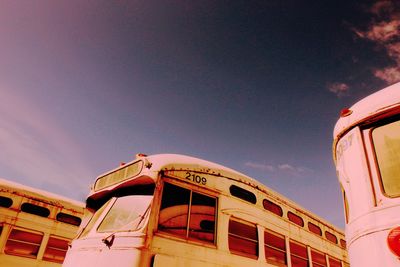 Low angle view of buses against sky