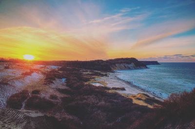 Scenic view of sea at sunset