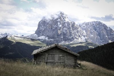 Built structure on mountain against sky