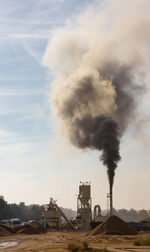 Cement chimney generating harmful emissions and pollution to the environment