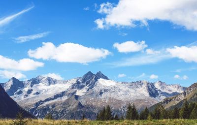 Scenic view of snowcapped mountains against sky