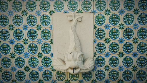 Close-up of sculpture on wall